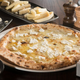 Image for article titled A pizza world champion made this 99-cheese pizza and it tastes fantastic